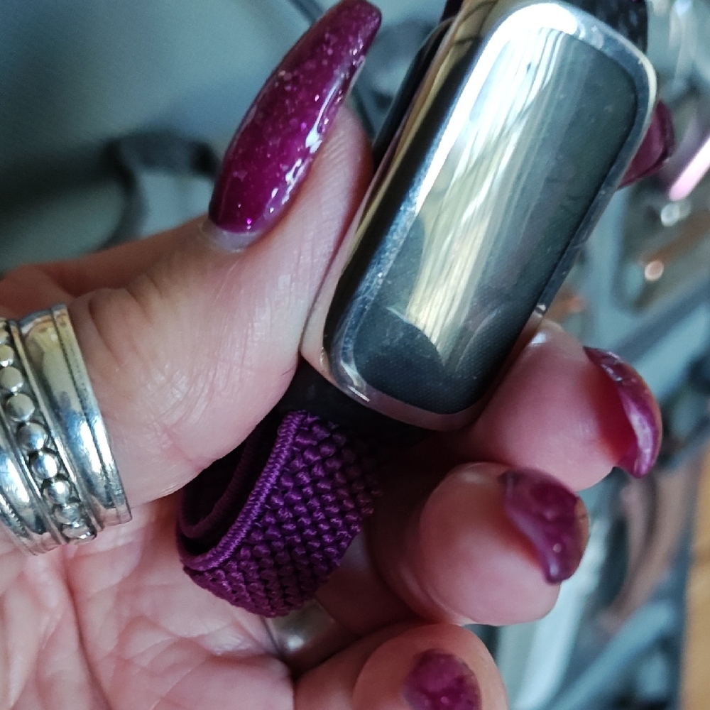 Fitbit Deep Purple Fitness Tracker And Replacement Bands Over $400